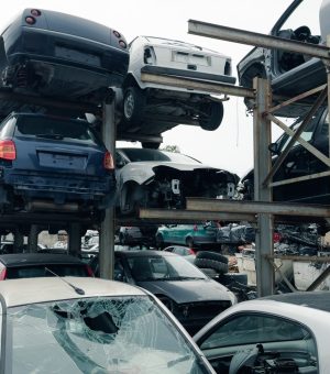 stacked-scrap-cars-recovery-of-car-components-PDJNLQP